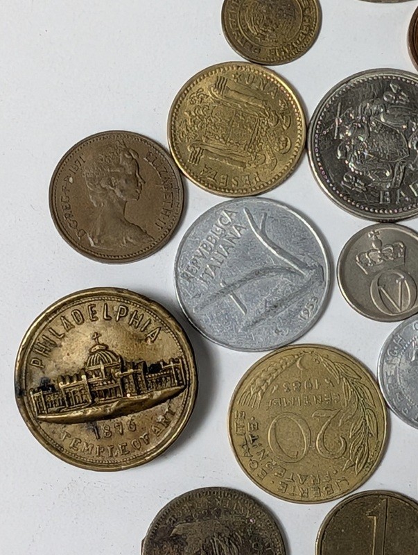 Assorted international coins and tokens - image 14 of 28