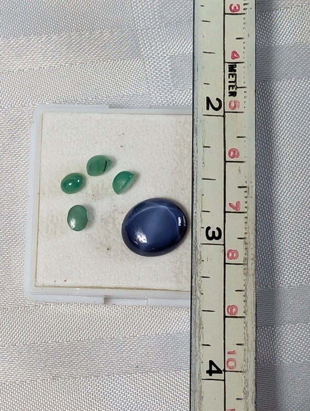 Green teardrop gemstones and a blue cabochon in display box - image 7 of 8