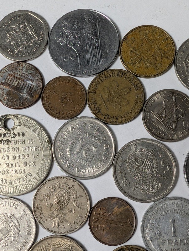 Assorted international coins and tokens - image 7 of 24