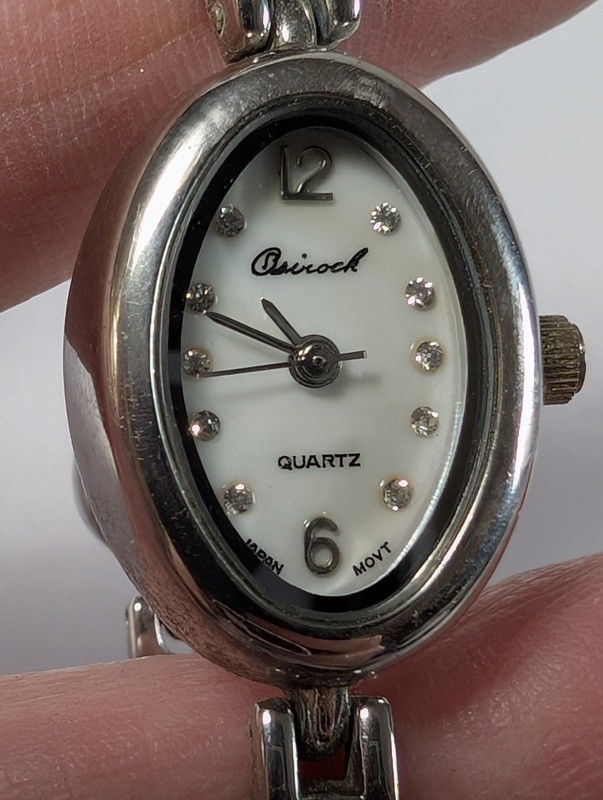 Quartz bracelet watch with purple gemstone accents - image 8 of 15