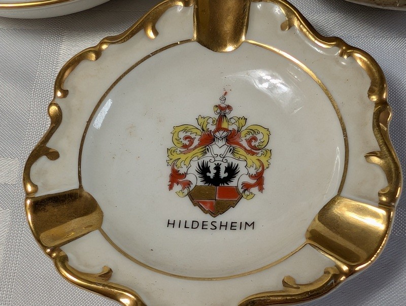 Assorted ceramic dishware with floral, heraldic, and landscape designs - image 3 of 16