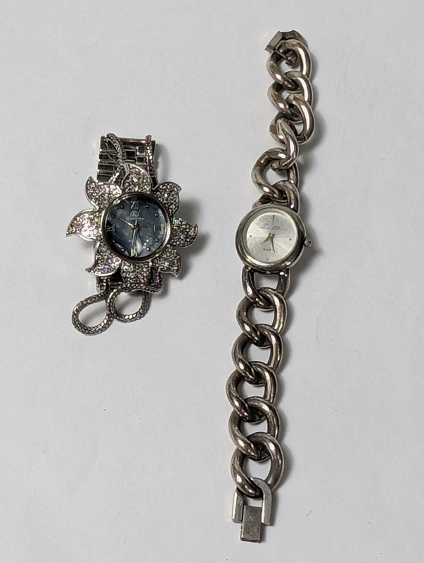 Floral rhinestone pendant watch and silver link bracelet watch - image 1 of 11