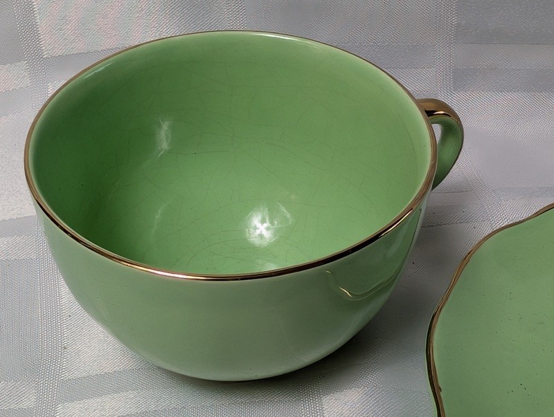Green teacup and saucer set with gold trim - image 6 of 9