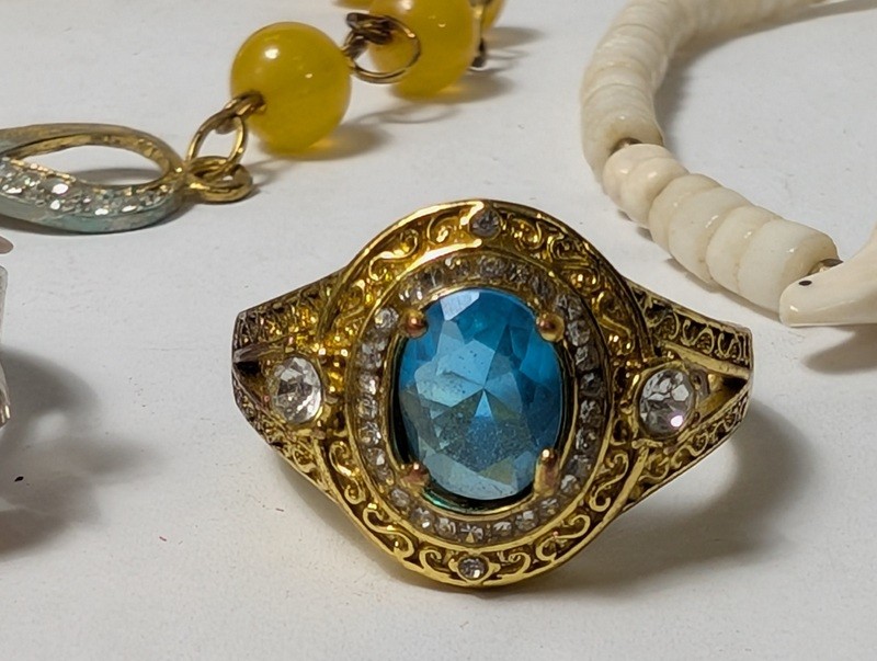 Yellow bead bracelet, white bead necklace, and two rings - image 3 of 10