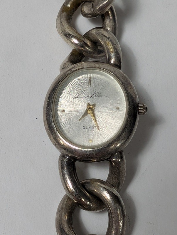 Floral rhinestone pendant watch and silver link bracelet watch - image 9 of 11