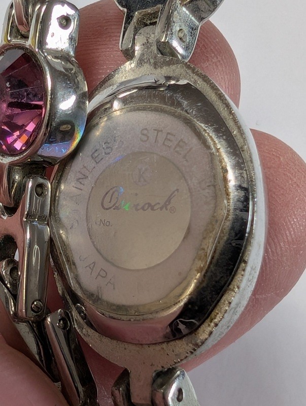 Quartz bracelet watch with purple gemstone accents - image 14 of 15