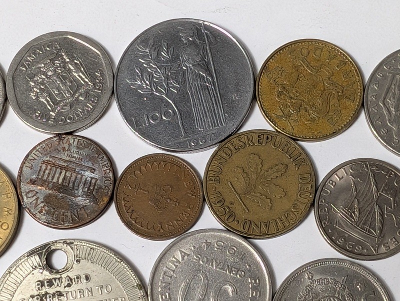 Assorted international coins and tokens - image 17 of 24
