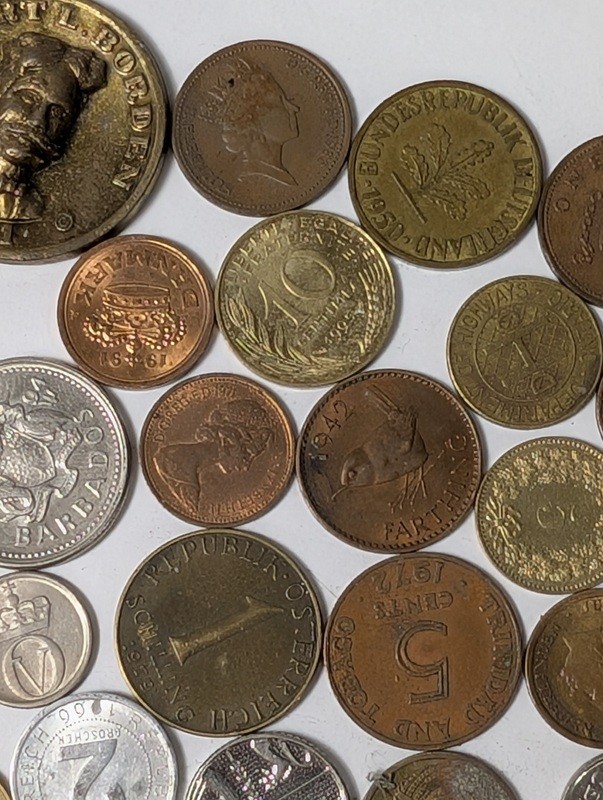Assorted international coins and tokens - image 12 of 28