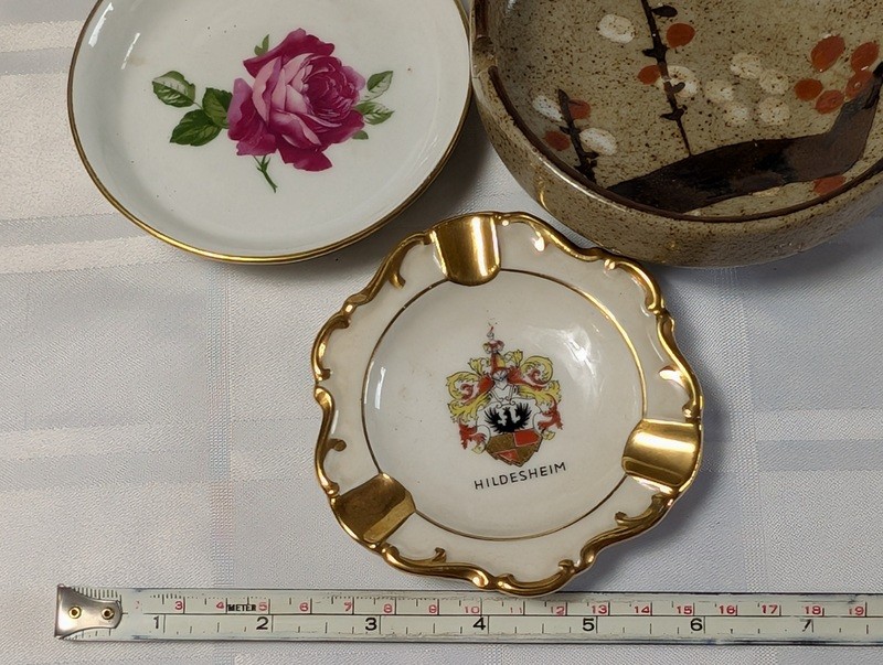 Assorted ceramic dishware with floral, heraldic, and landscape designs - image 15 of 16