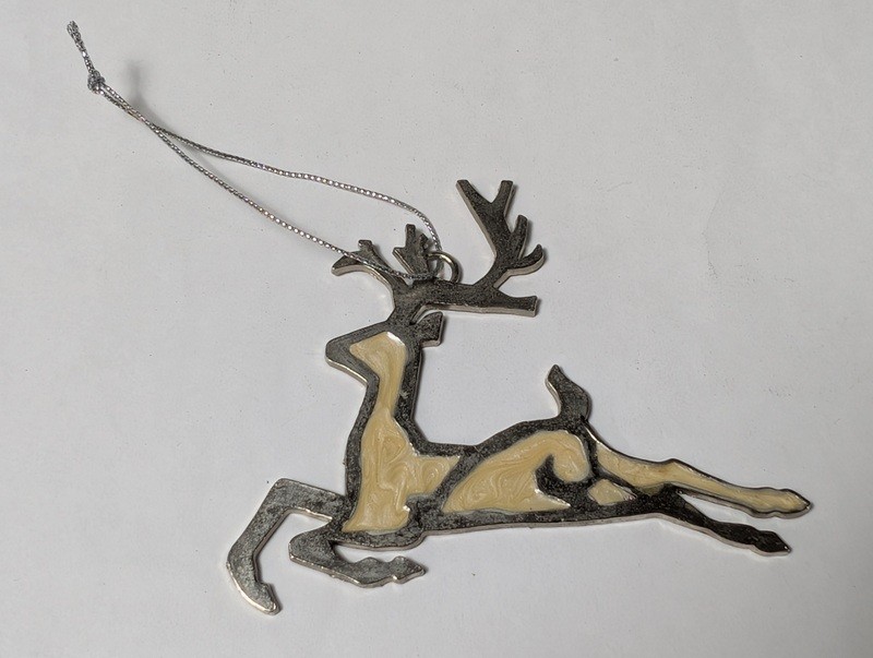 Reclining reindeer metal ornament - image 1 of 7