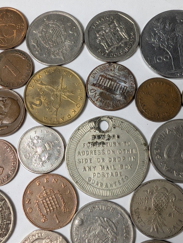 Assorted international coins and tokens - image 6 of 24
