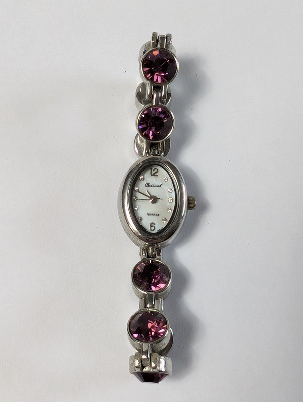 Quartz bracelet watch with purple gemstone accents - image 2 of 15