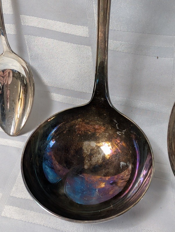 Set of tarnished silver spoons and a serving ladle - image 7 of 10