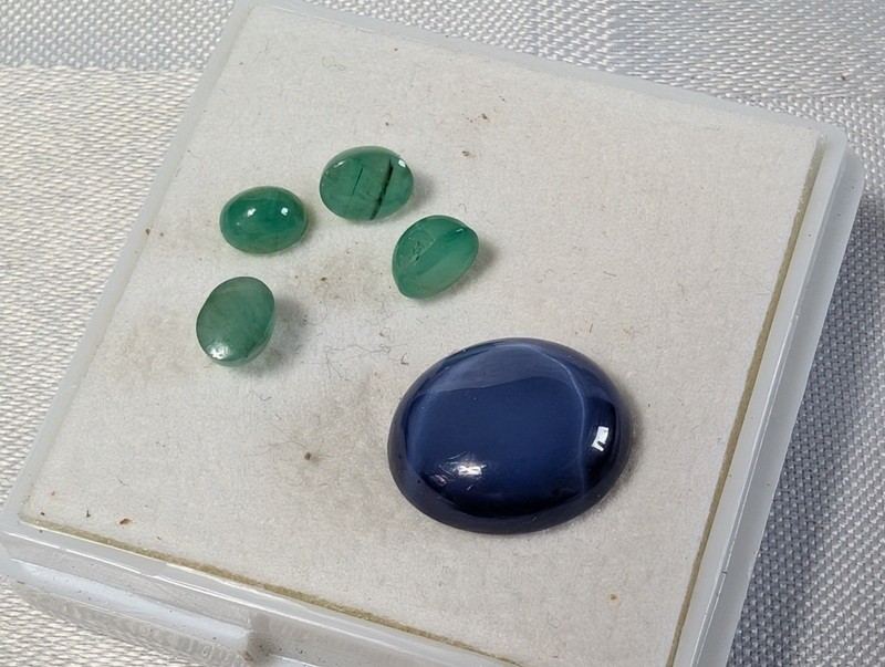 Green teardrop gemstones and a blue cabochon in display box - image 5 of 8