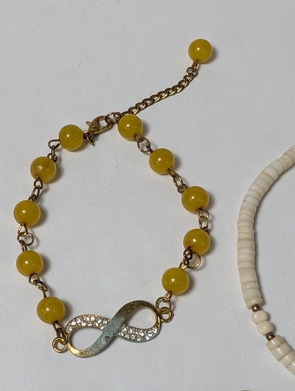 Yellow bead bracelet, white bead necklace, and two rings - image 6 of 10