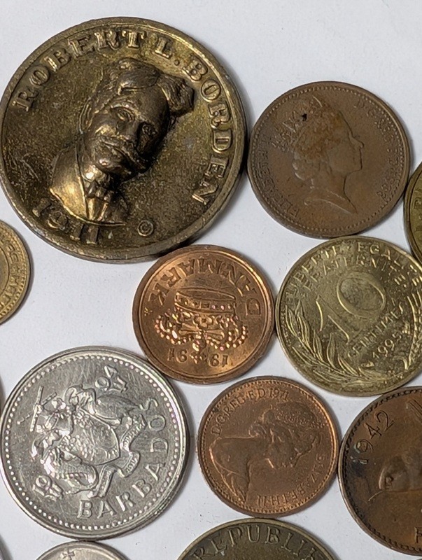 Assorted international coins and tokens - image 25 of 28
