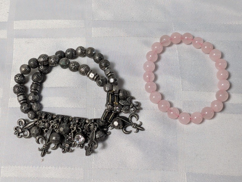 Silver-tone charm bracelet and pink beaded bracelet - image 1 of 10