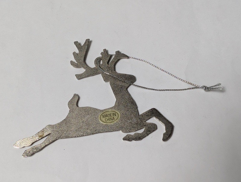 Reclining reindeer metal ornament - image 5 of 7