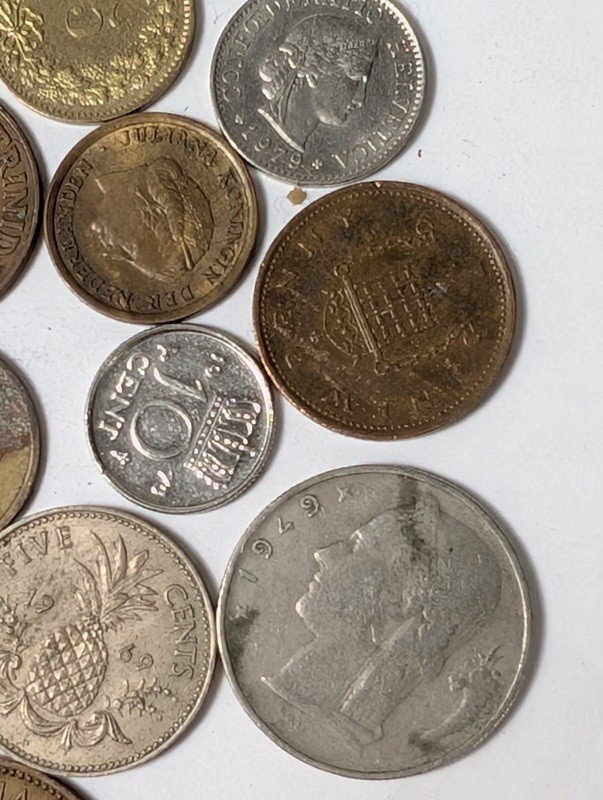 Assorted international coins and tokens - image 20 of 28