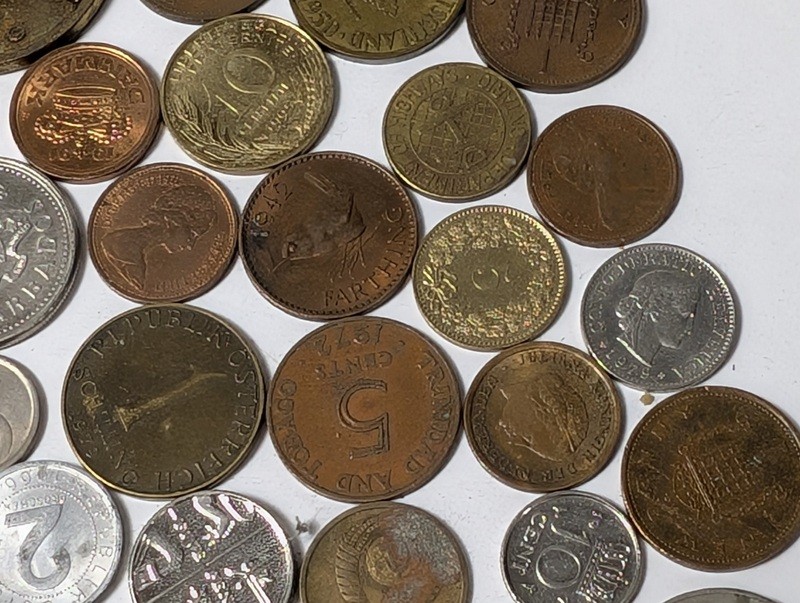 Assorted international coins and tokens - image 7 of 28