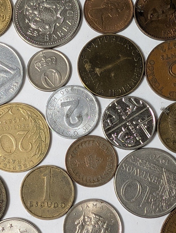 Assorted international coins and tokens - image 15 of 28