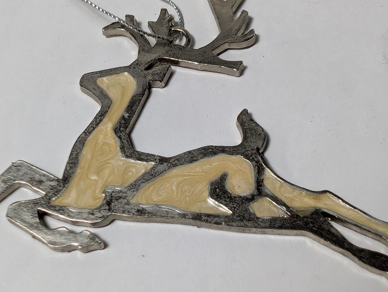 Reclining reindeer metal ornament - image 3 of 7