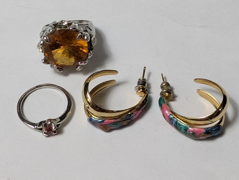 Citrine ring, pink gemstone ring, and enamel hoop earrings - image 1 of 13