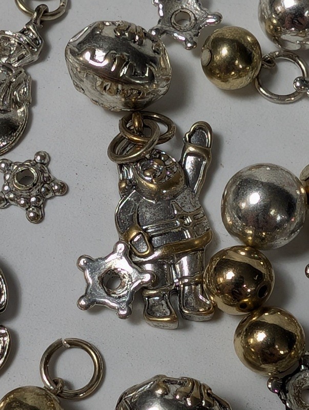 Assorted metal charms and beads (astronaut, bells, stars) - image 7 of 15