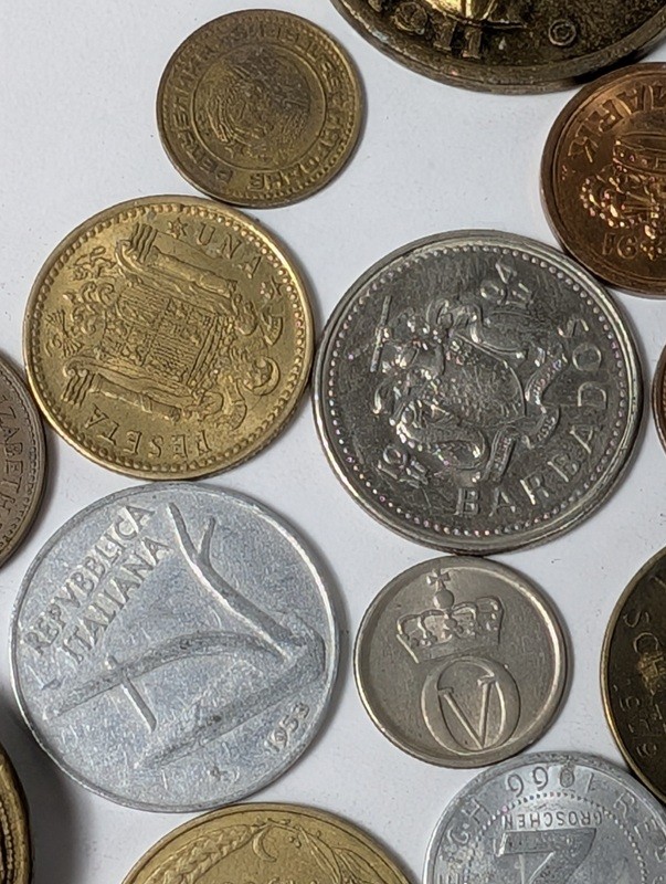 Assorted international coins and tokens - image 26 of 28