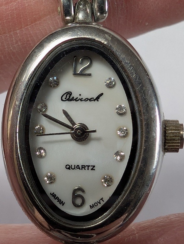 Quartz bracelet watch with purple gemstone accents - image 7 of 15