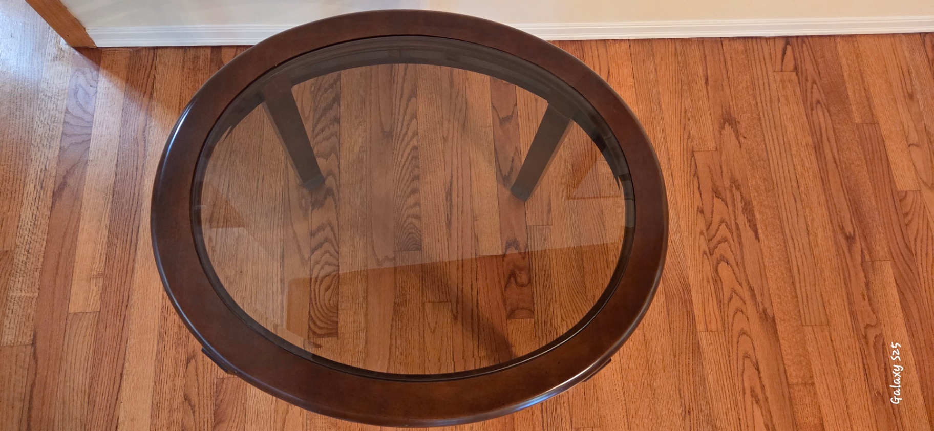 Round glass-top coffee table - image 2 of 3