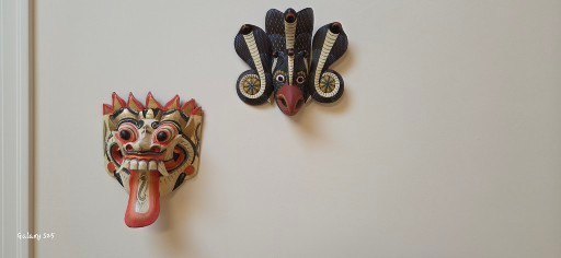 Decorative Carved Mask and Llama-Print Wool Textile - image 1 of 2
