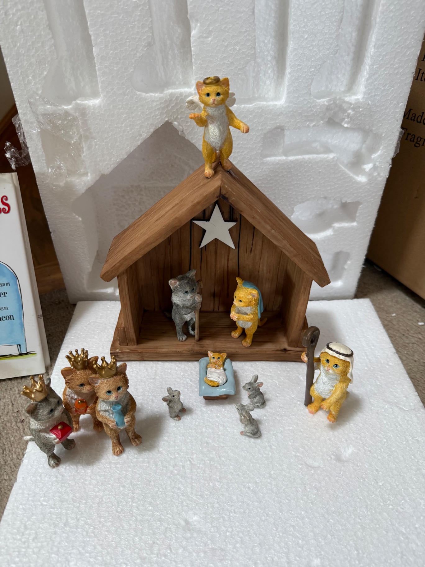 Cat Figurine Collection with Nativity Scene and Books - image 1 of 10