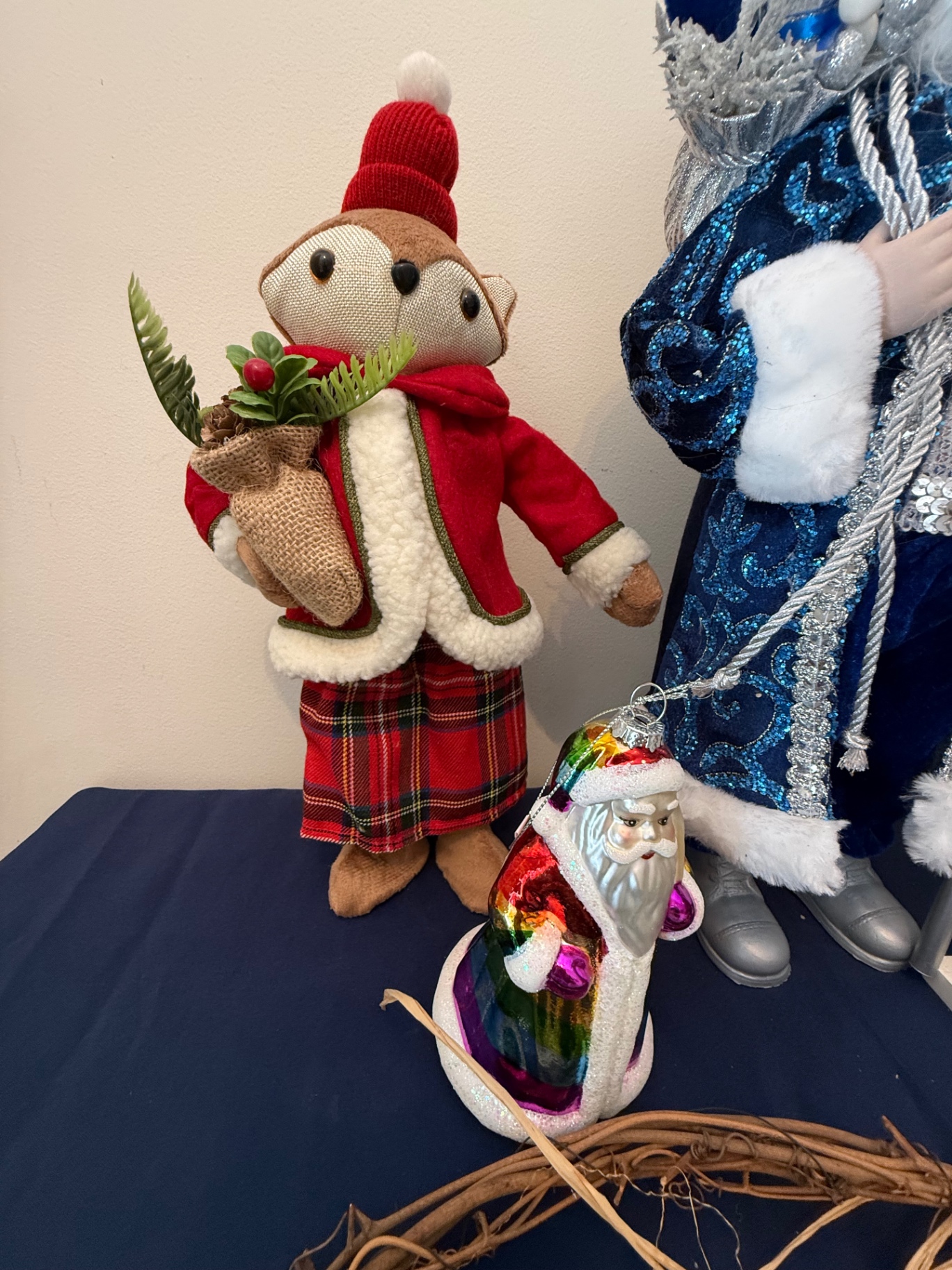 Deck the Halls holiday display with Santa figures and surroundings - image 2 of 5