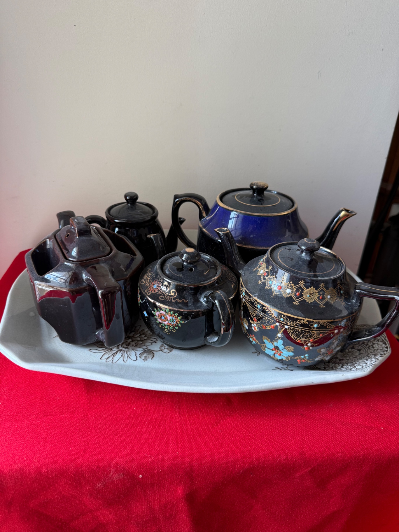 Ceramic Teapot Collection on Decorative Tray - image 1 of 14