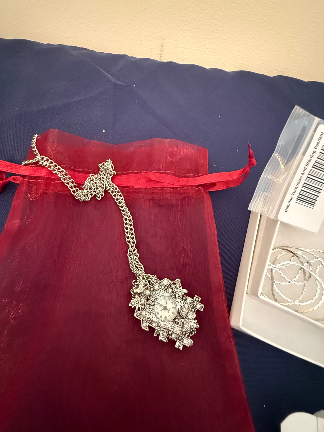 Silver-tone jewelry set with turquoise pendant, bracelet, and assorted charms - image 4 of 6