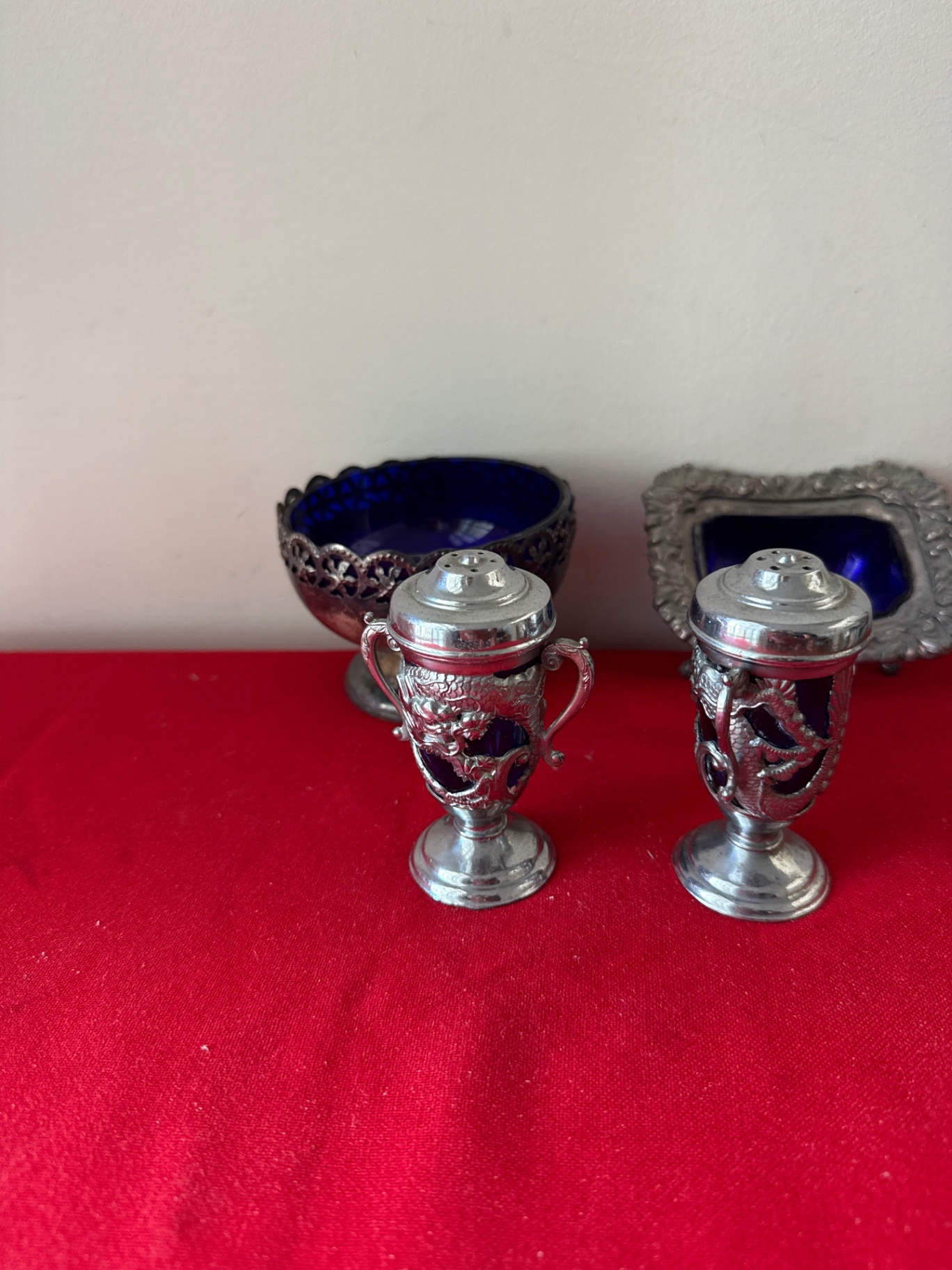 Ornate silver-tone salt and pepper shakers with cobalt blue glass bowl and frame - image 1 of 5