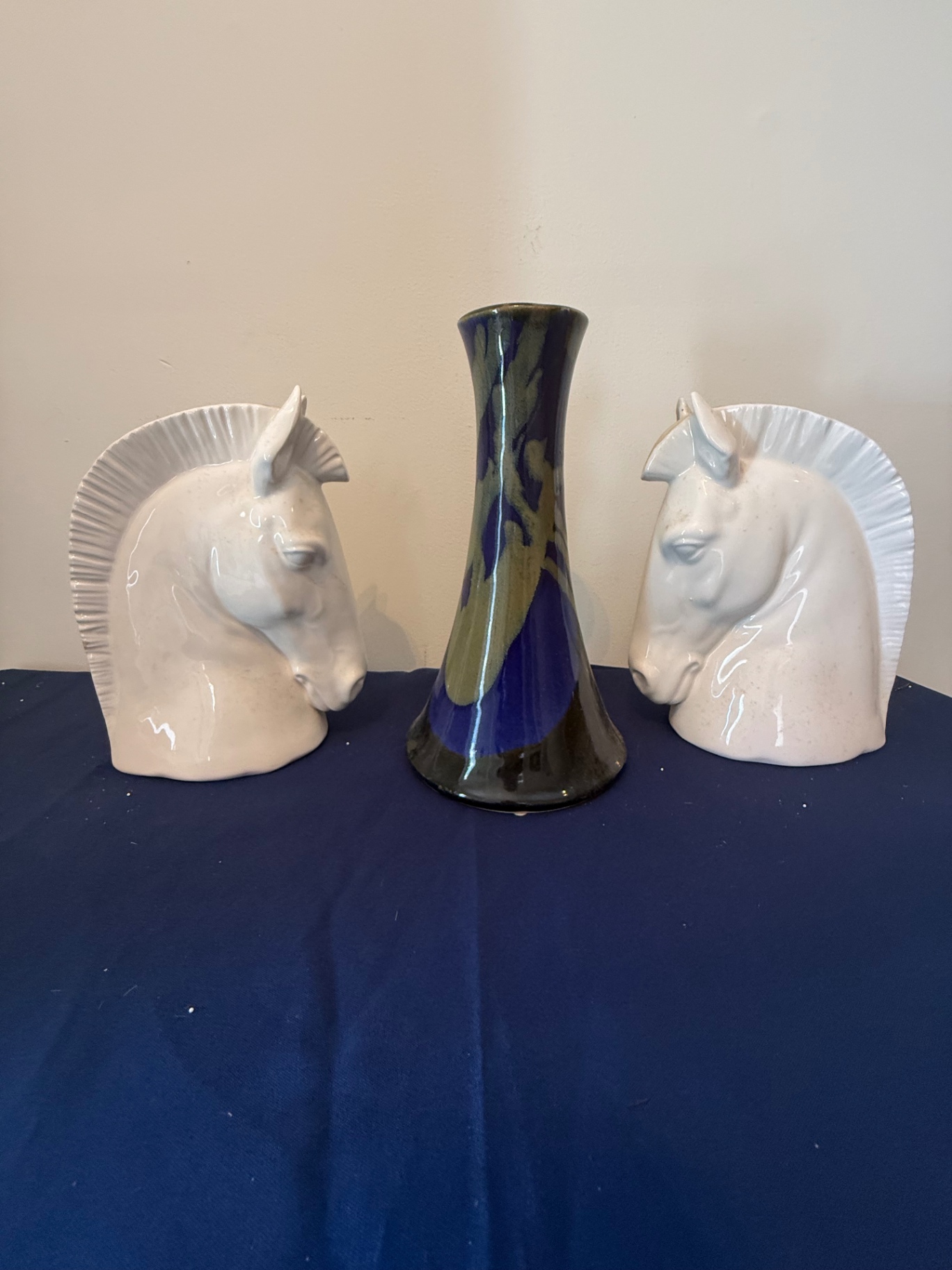 Pair of horse head ceramic busts with a tall glazed vase - image 1 of 5