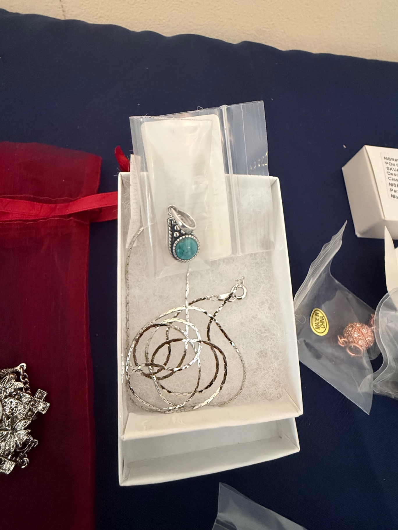 Silver-tone jewelry set with turquoise pendant, bracelet, and assorted charms - image 2 of 6