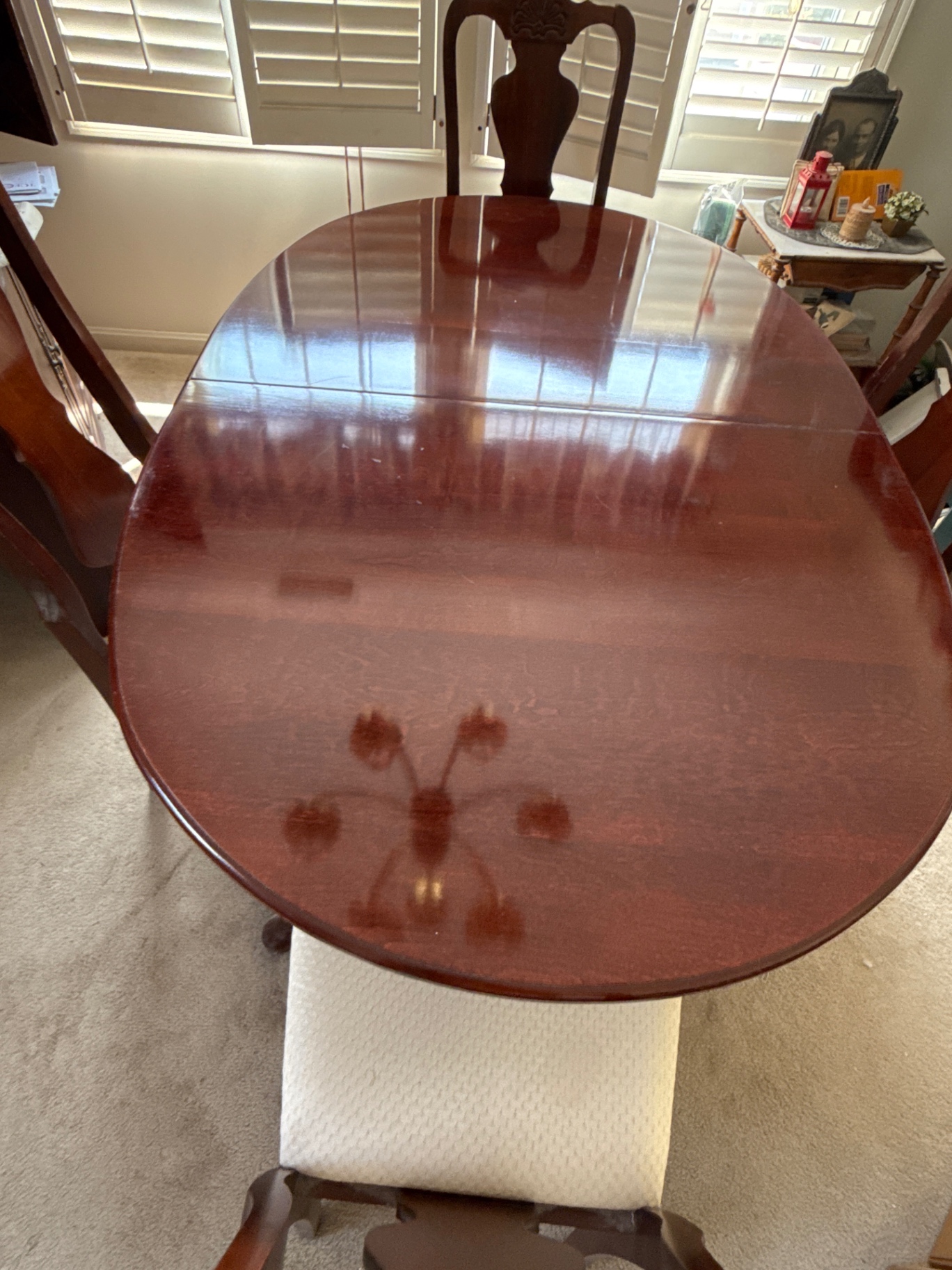 Oval wooden dining table with chairs - image 2 of 3