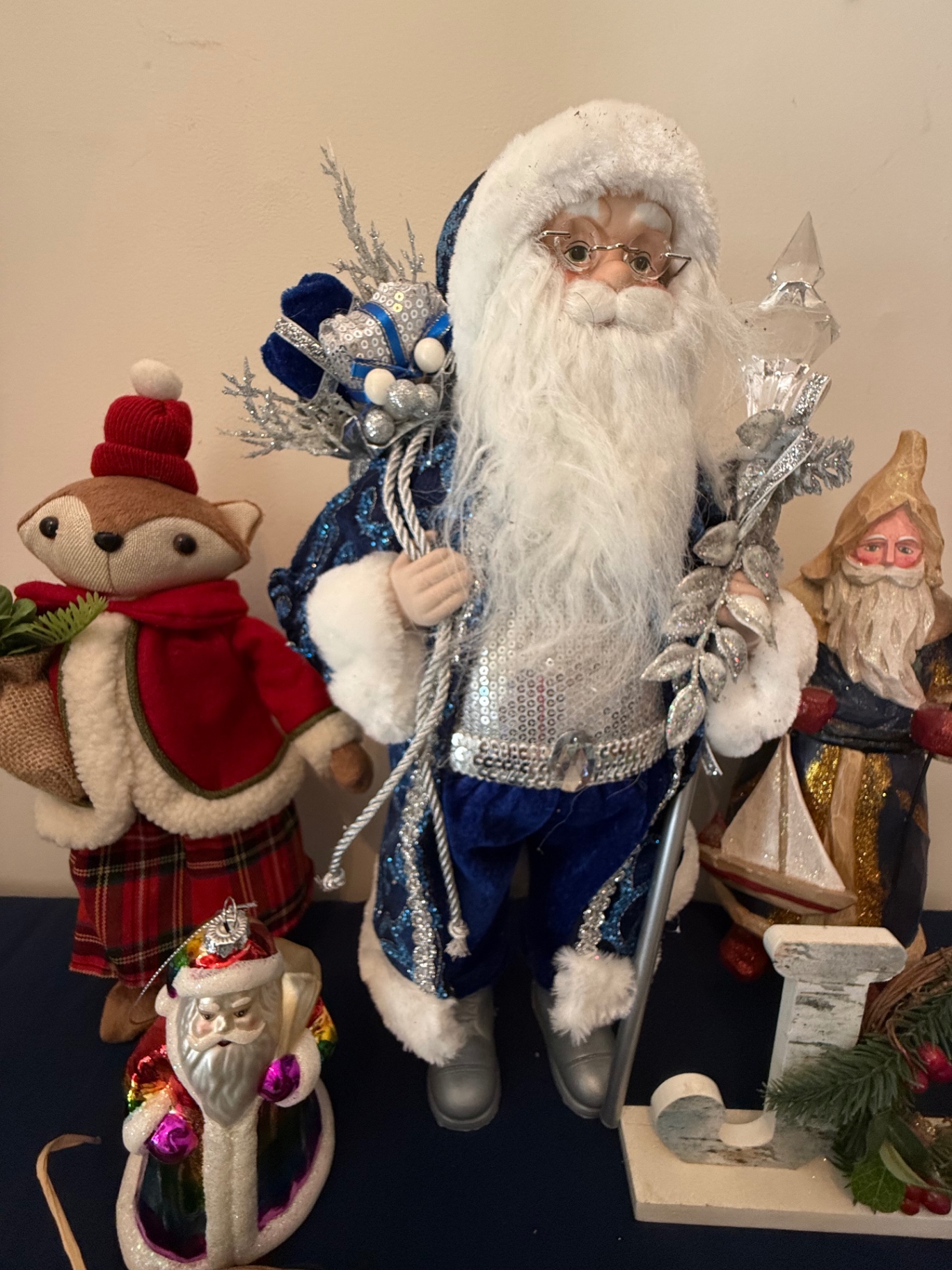 Deck the Halls holiday display with Santa figures and surroundings - image 3 of 5