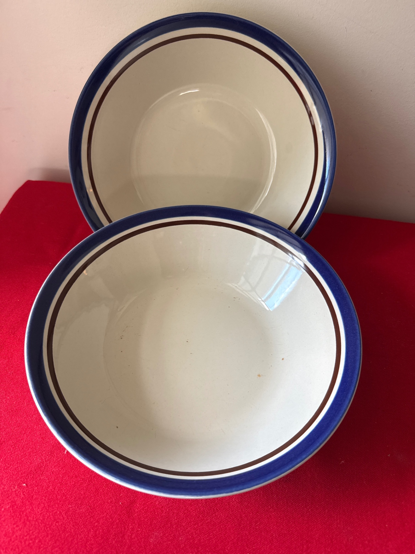 Blue-rimmed hand-painted ceramic plates - image 2 of 3