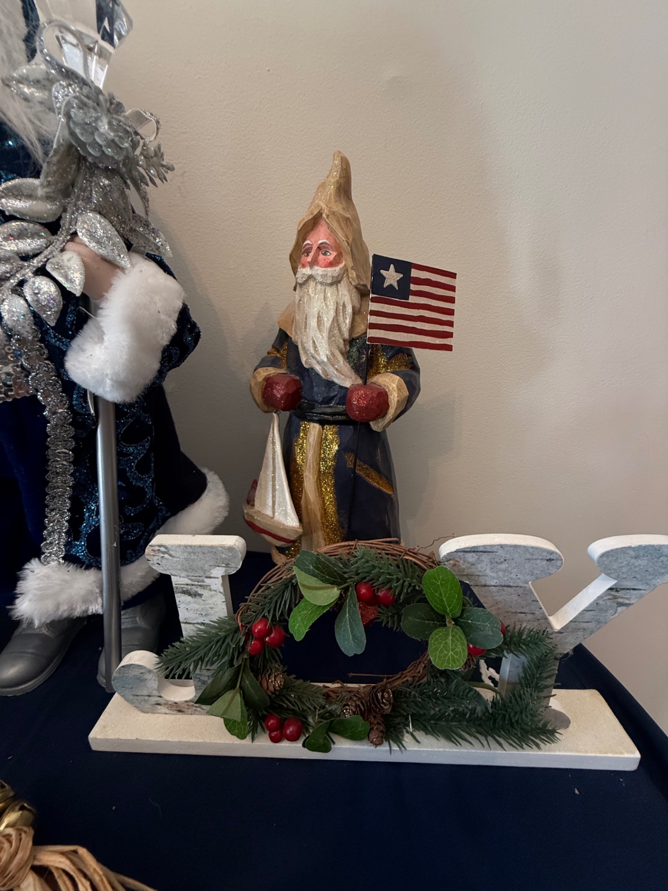 Deck the Halls holiday display with Santa figures and surroundings - image 4 of 5