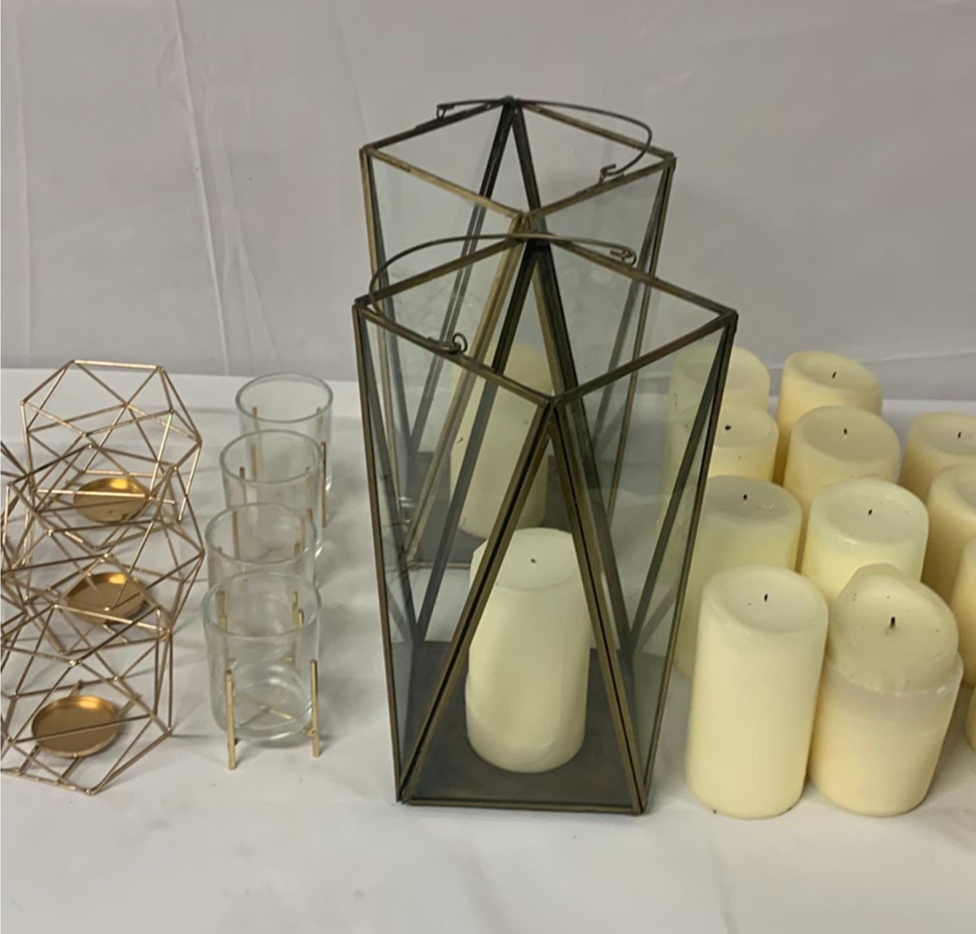 Copper And Brass Toned Candle Holders And Candles - image 1 of 8