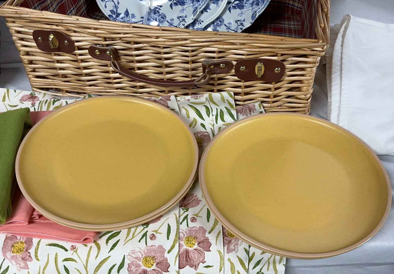 Wicker picnic baskets with blue floral and yellow dinnerware, glassware, and linens - image 2 of 12