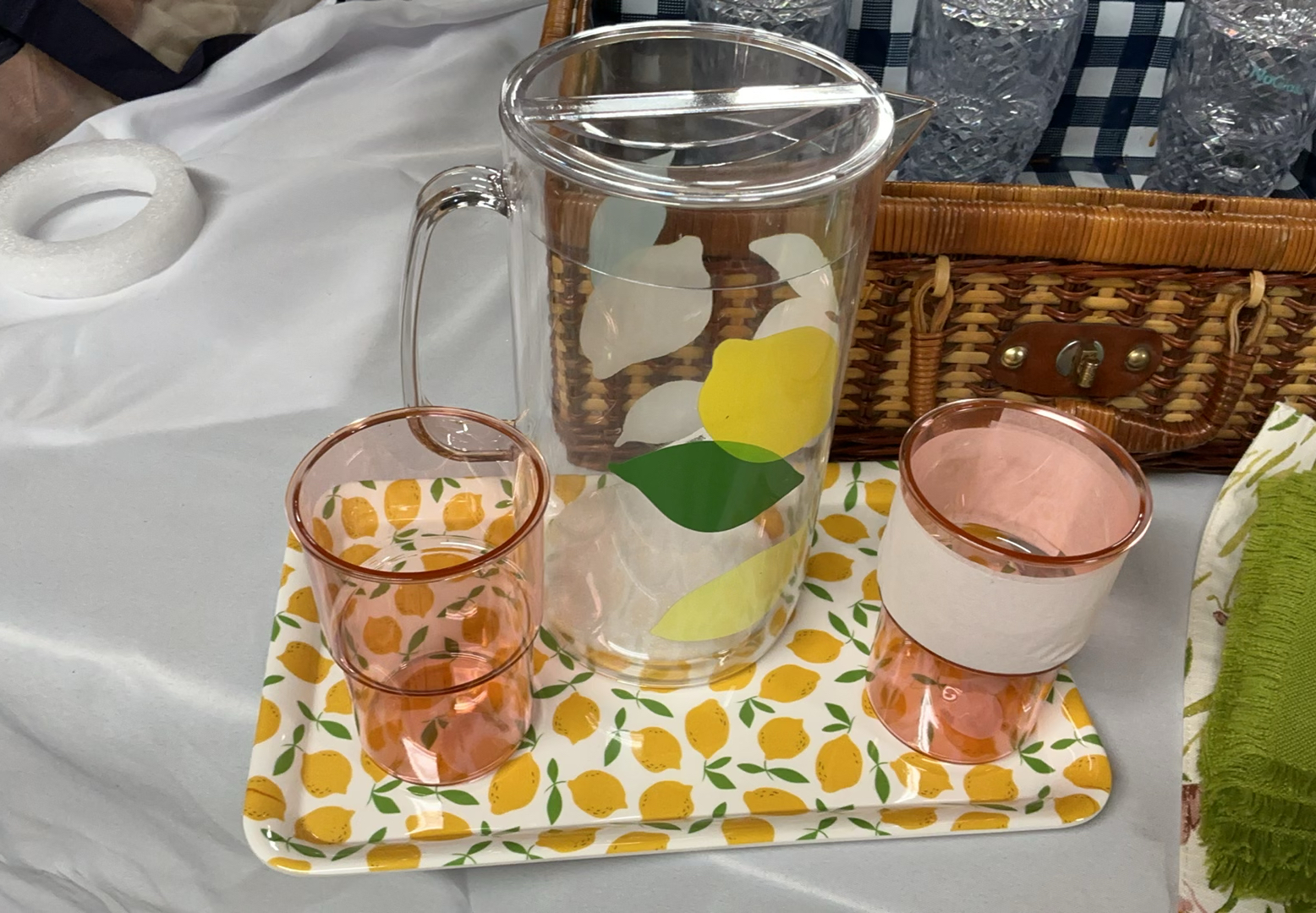 Wicker picnic baskets with blue floral and yellow dinnerware, glassware, and linens - image 5 of 12