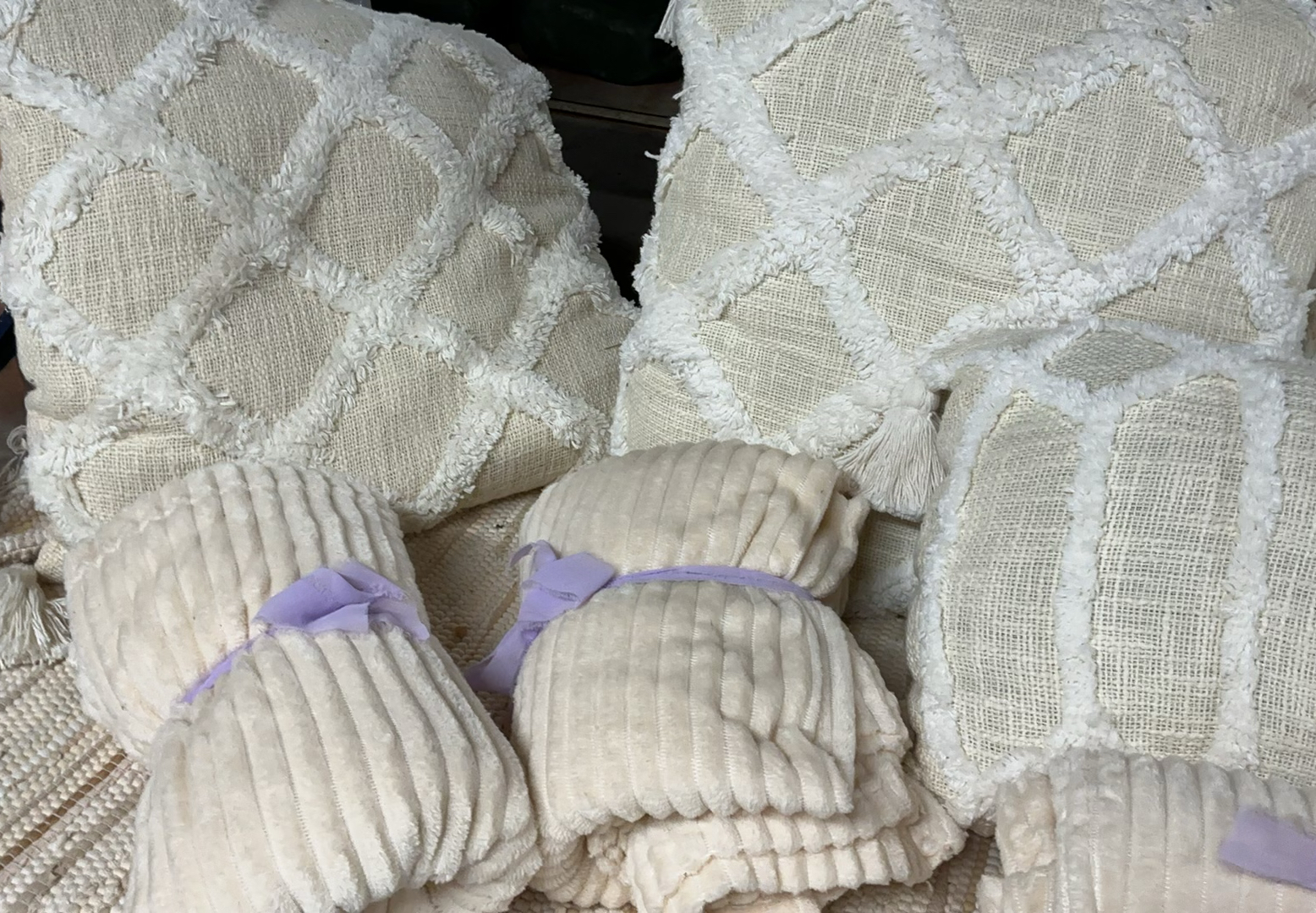 Beige decorative pillows and matching throws - image 2 of 6