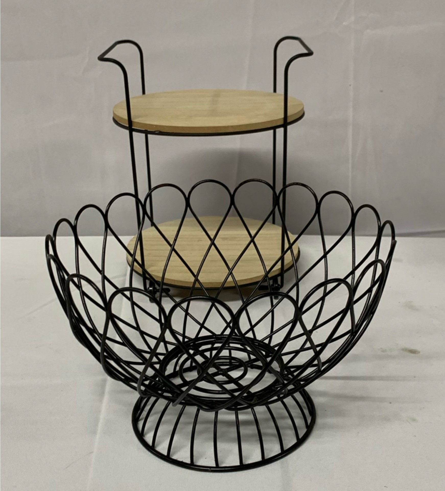 Black metal lanterns, wire baskets, and wooden tray stand - image 3 of 5