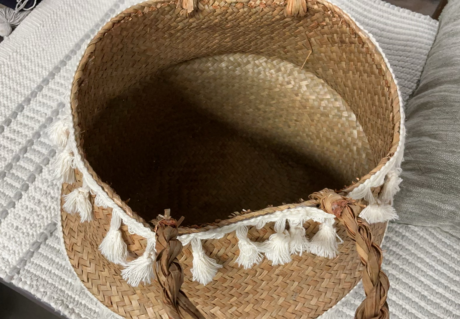 Woven throw blanket, straw basket with tassels, grey cushions, and tassel rug - image 3 of 8