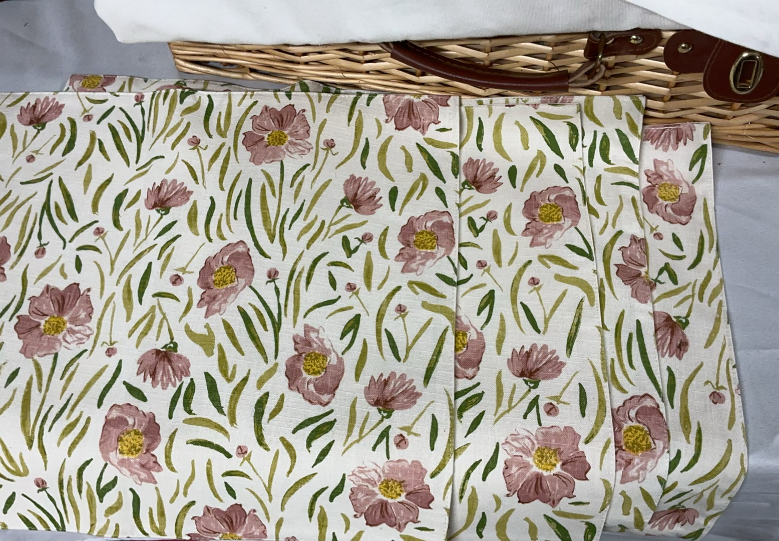 Wicker picnic baskets with blue floral and yellow dinnerware, glassware, and linens - image 11 of 12